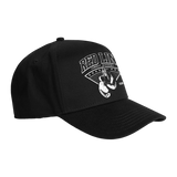 Black snapback hat with white logo from Red Line Combat Academy, side view showcasing the stylish design.