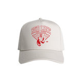 Red Line Combat Academy Bone Snapback Hat with red logo front, adjustable brim, and structured design.