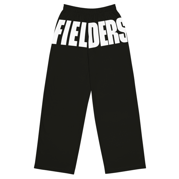 Unisex black wide-leg pants with bold print from Terreyl Fields, featuring an all-over print design and relaxed fit.