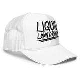 White foam trucker hat by Liquid Lowdown, showing the front view with adjustable strap and logo detail.